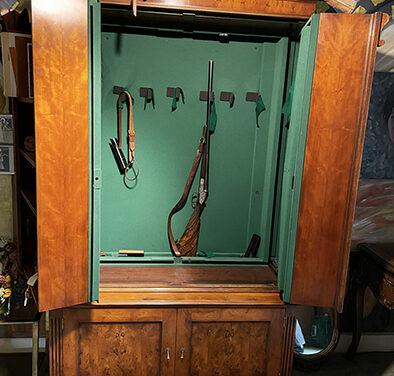 Armoire à fusils anglaise dissimulée